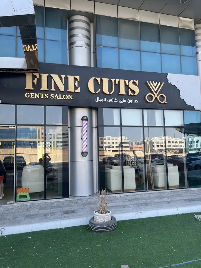Fine Cuts shopfront with its Arabic and English sign