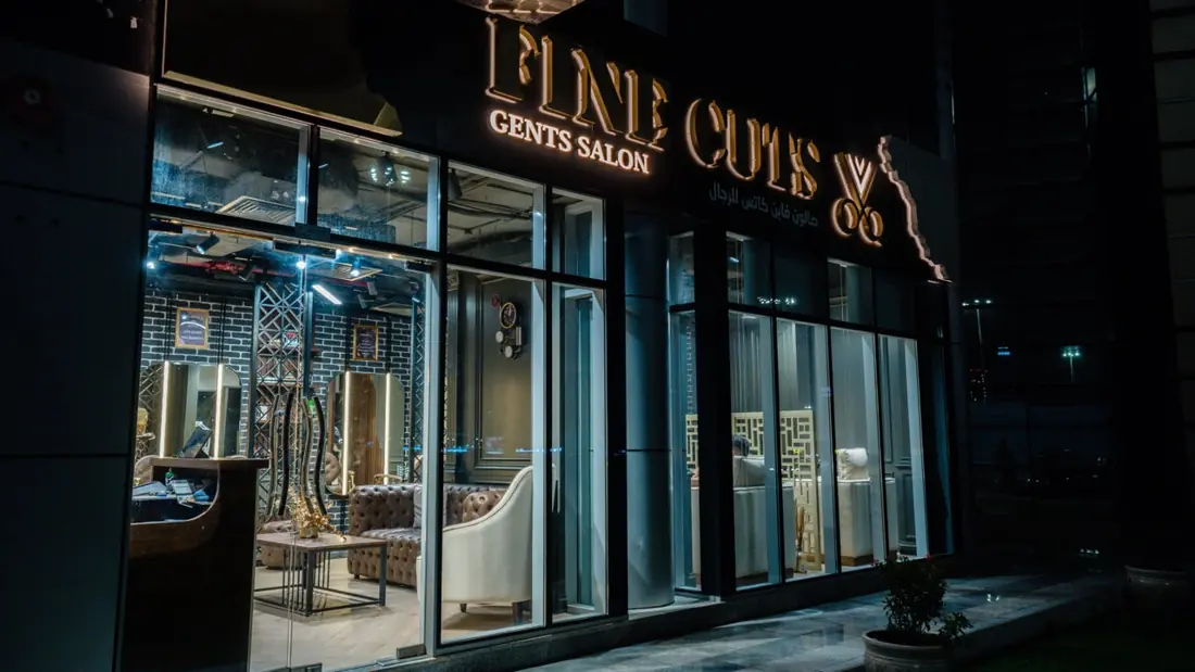 Fine Cuts lit up at night